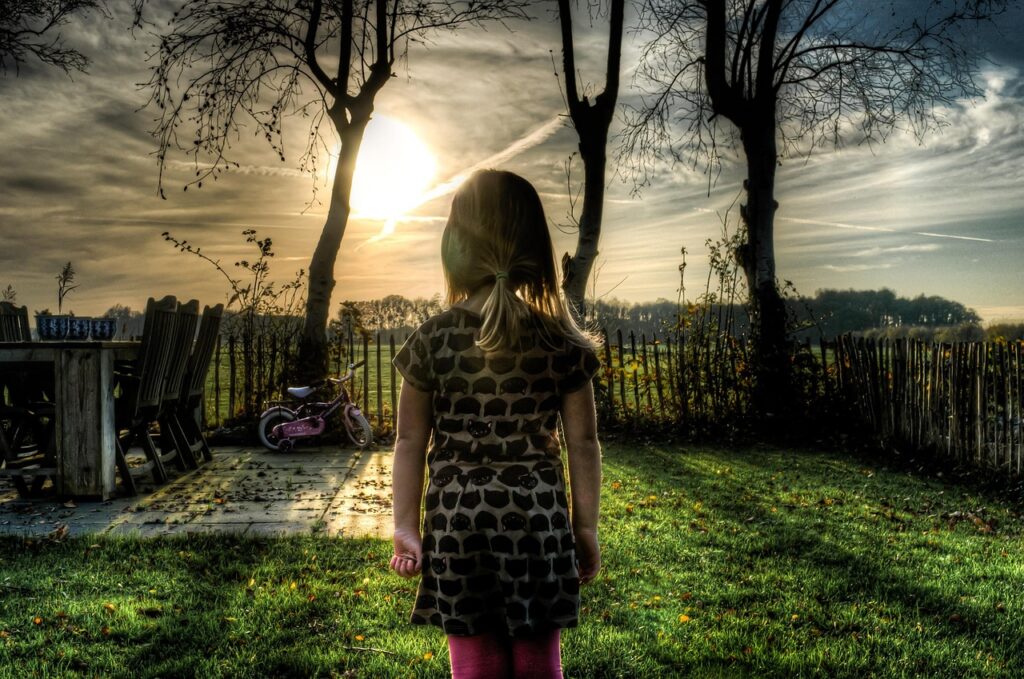 girl stood in garden after refusing to go to school